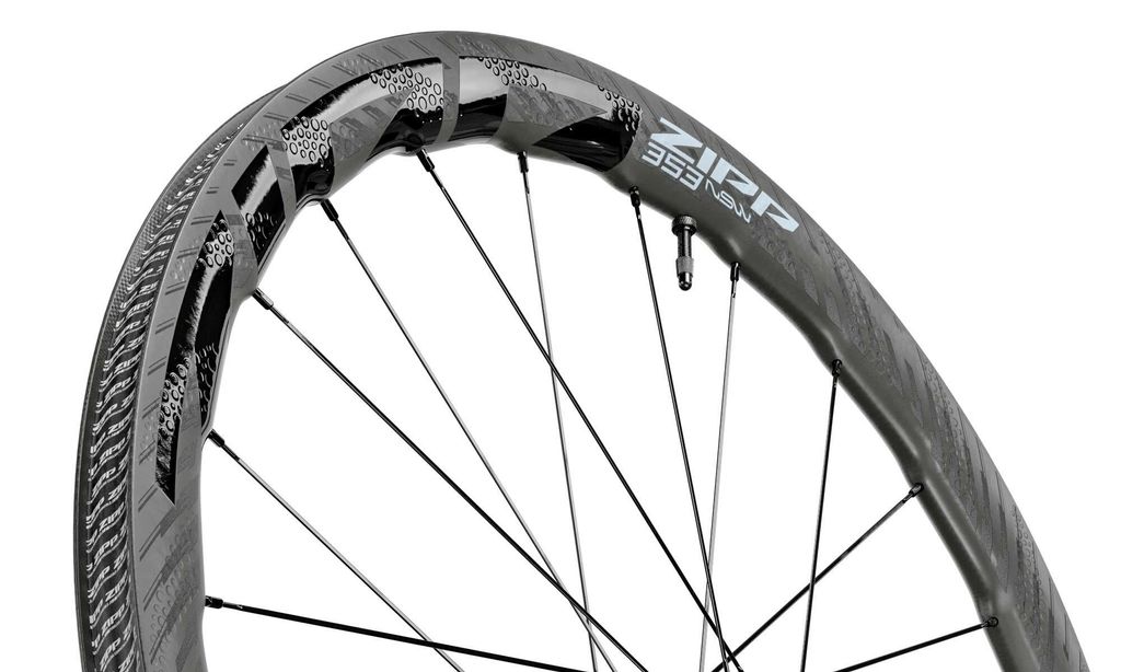 Zipp-353-NSW-tubeless-wheels_ultra-wide-25mm-internal-hookless-tubeless-carbon-disc-brake-road-bike-wheelset_angled-rim-detail