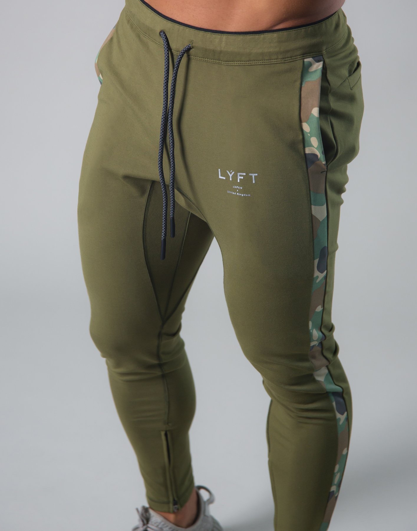 LYFT CAMO TRACK PANTS