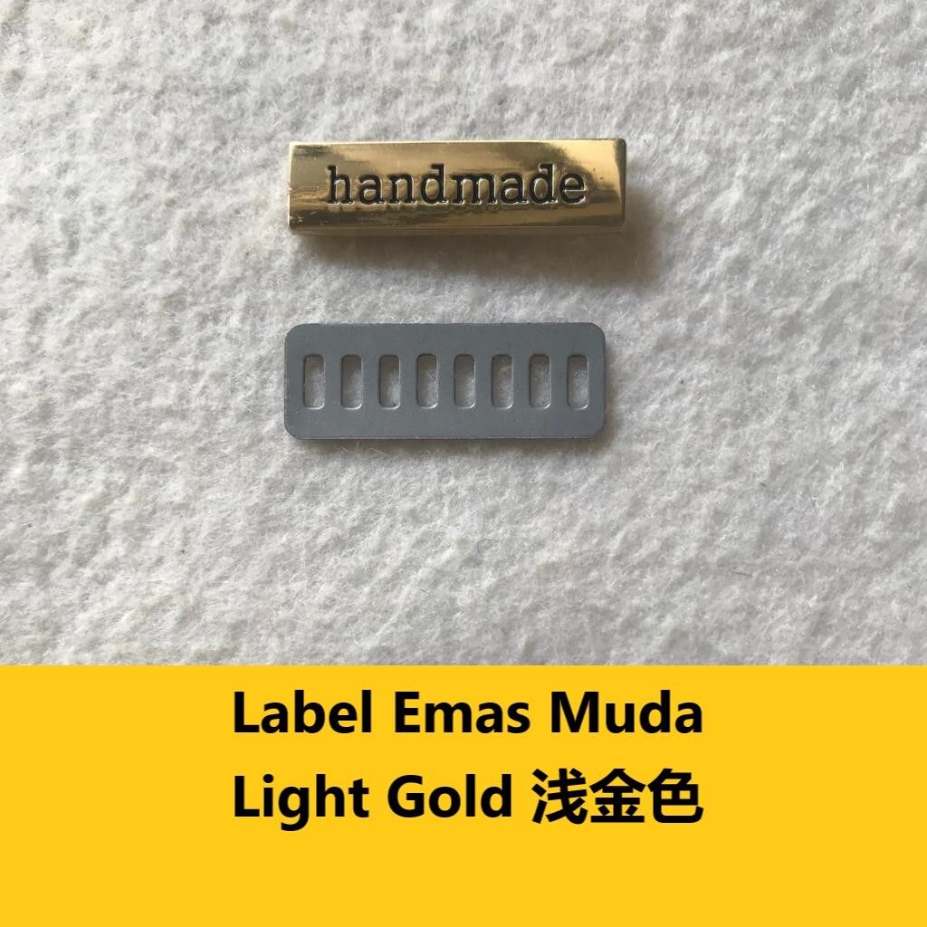 Label Emas Muda