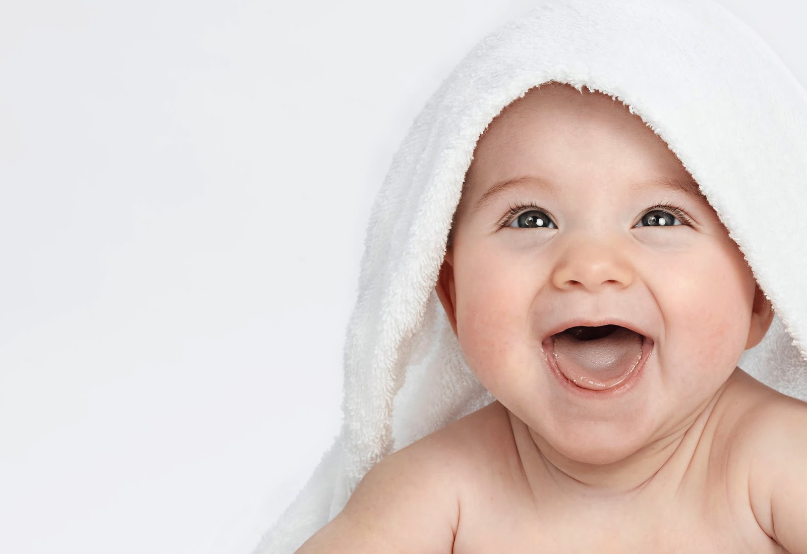 Cute-Smiling-Baby-Under-The-Towel.jpg