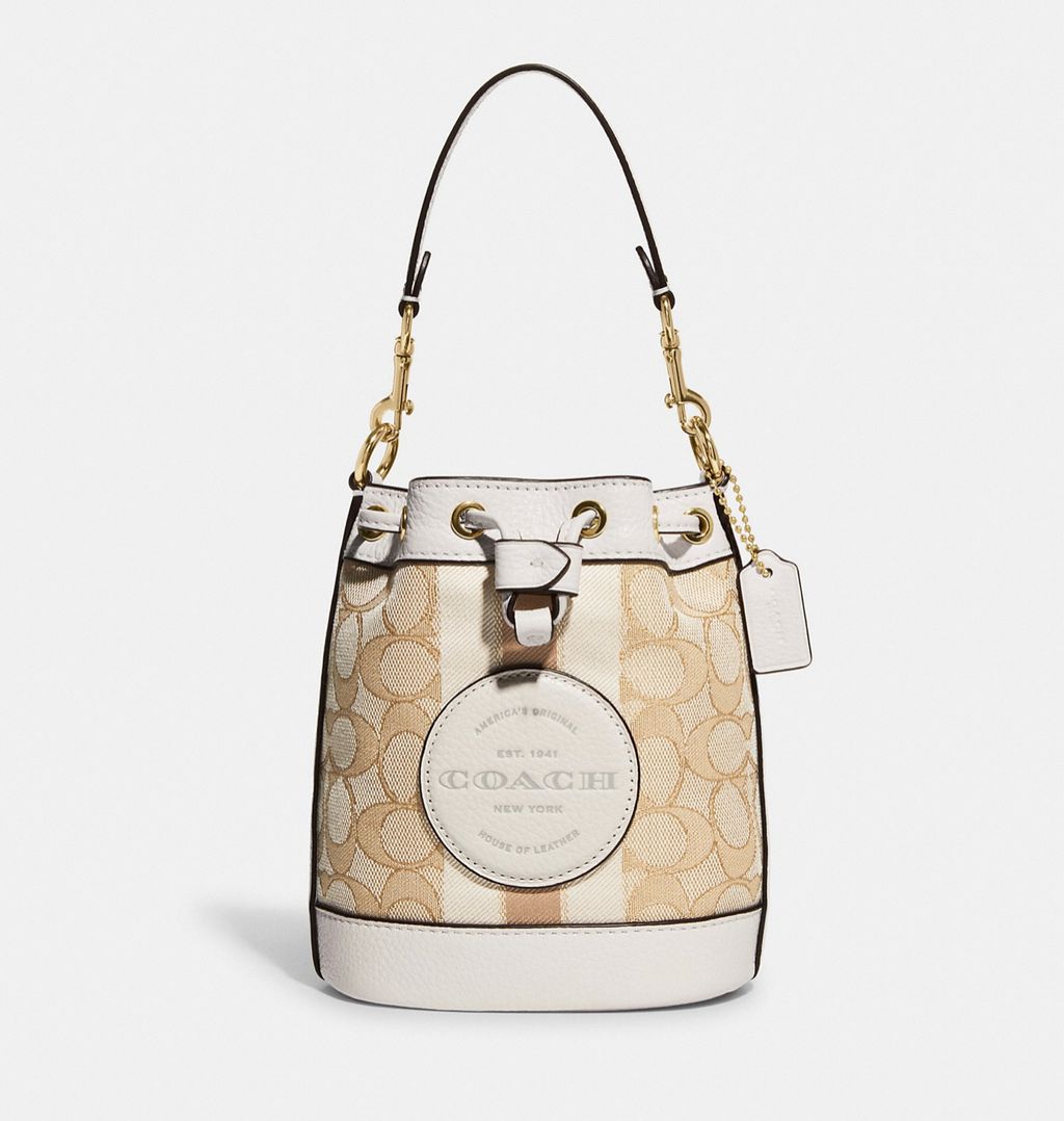 COACH®  Mini Dempsey Bucket Bag In Signature Canvas With Heart And Star  Print