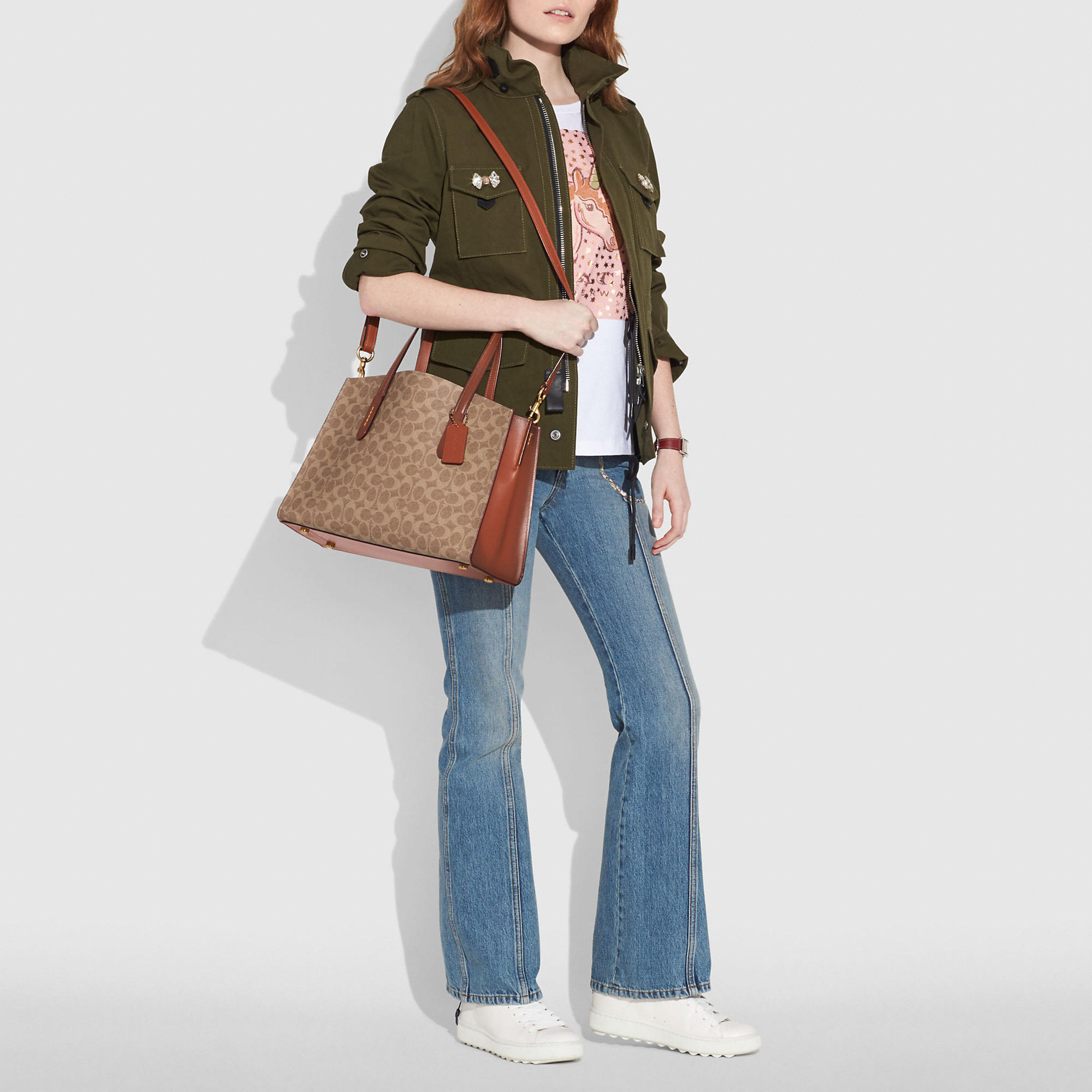coach charlie carryall in signature canvas