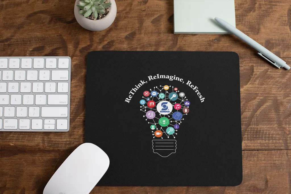 mousepad-mockup-lying-on-a-table-next-to-a-plant-pot-and-some-office-supplies-27553 (2).png