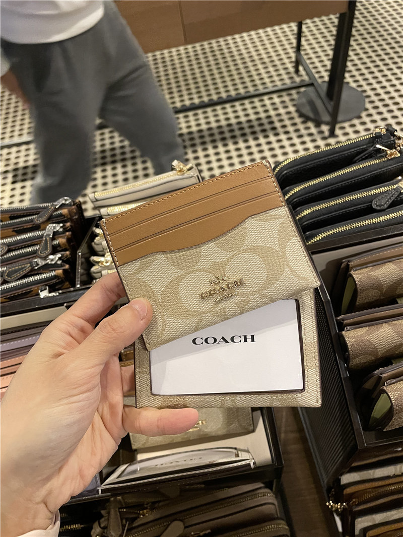 COACH®: Slim Card Case In Signature Canvas