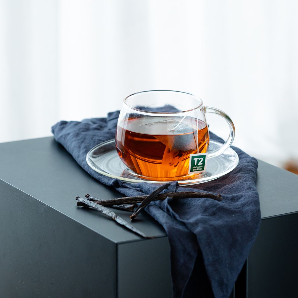H205BG012_classier_glassier_glass_cup_and_saucer_lifestyle_1