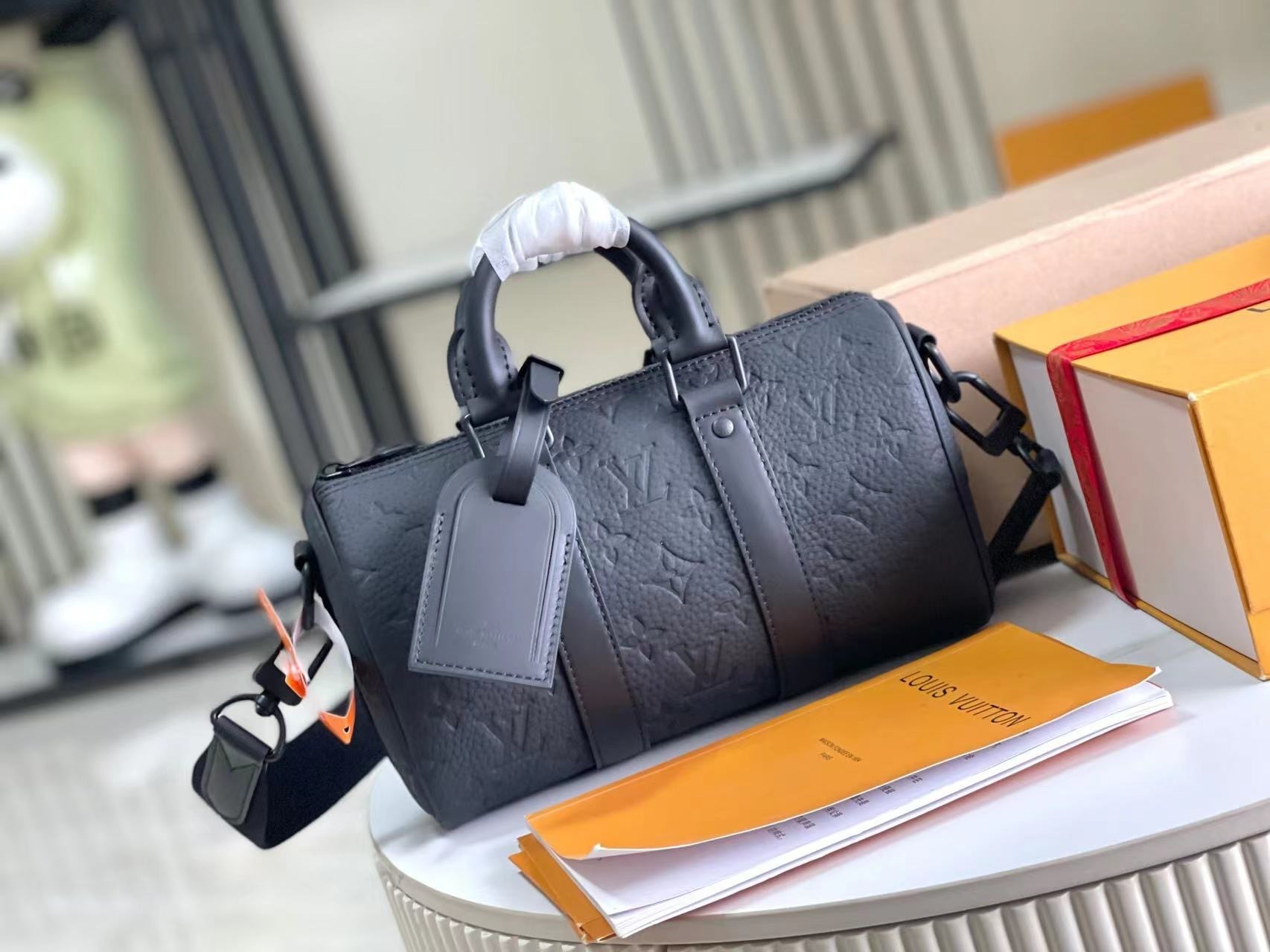 LV keepall 25 bag Theluxystudio