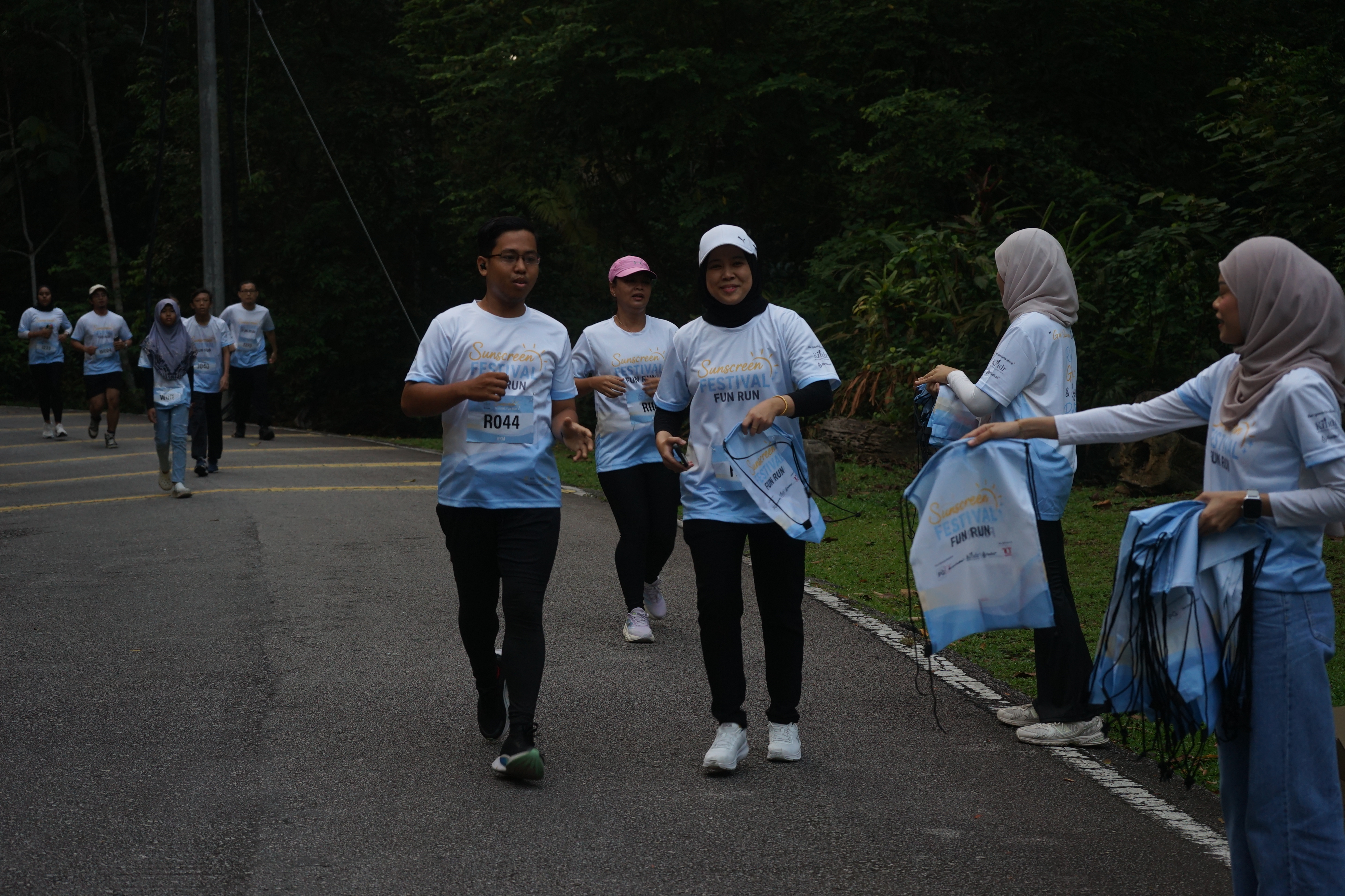 Participants taking part in the 5KM Fun Run and checkpoint activities