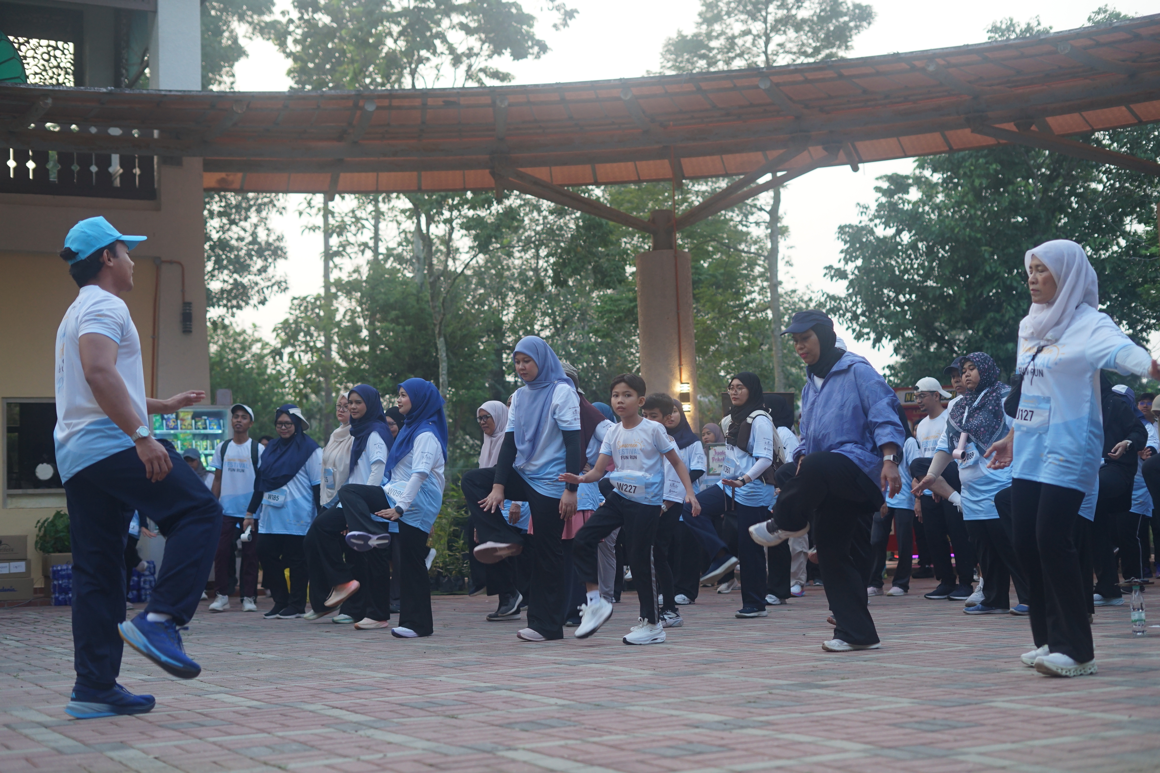 Participants enjoying the activities at the Sunscreen Festival Fun Run