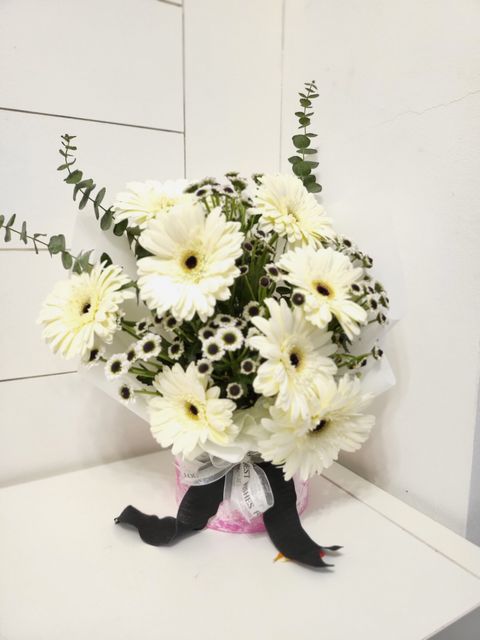 Bouquet of White Gerbera And Chamomile Flowers