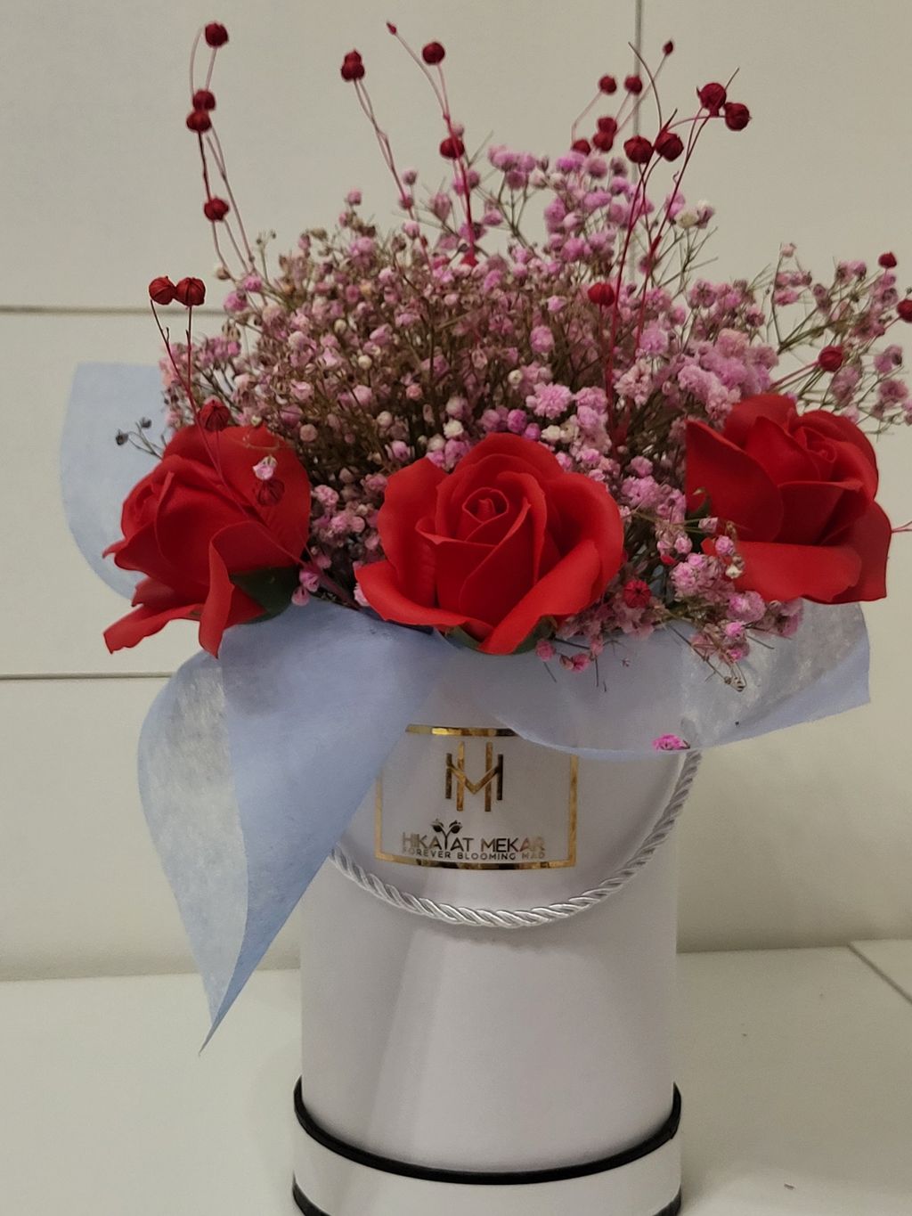 3 Red Roses with Pink Baby Breath bouquet