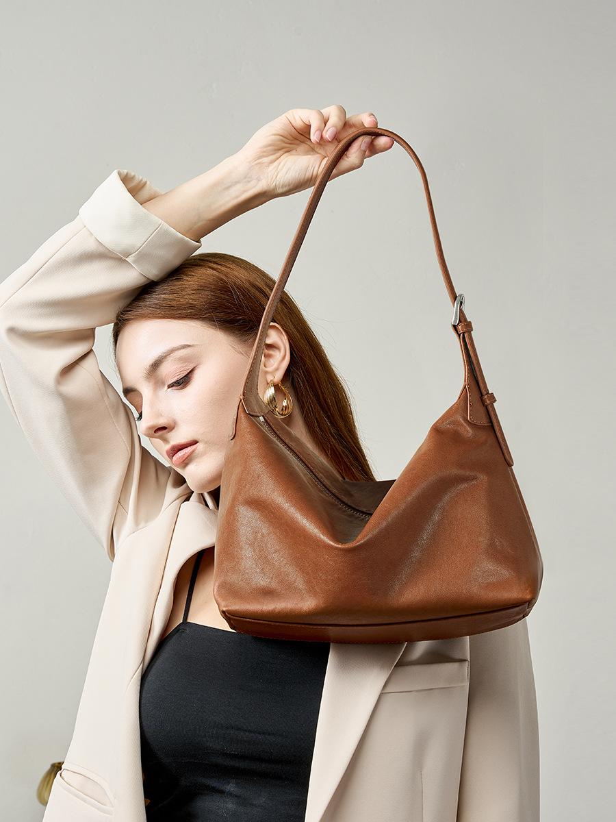 Model showcasing Classic Hobo Bag in Walnut