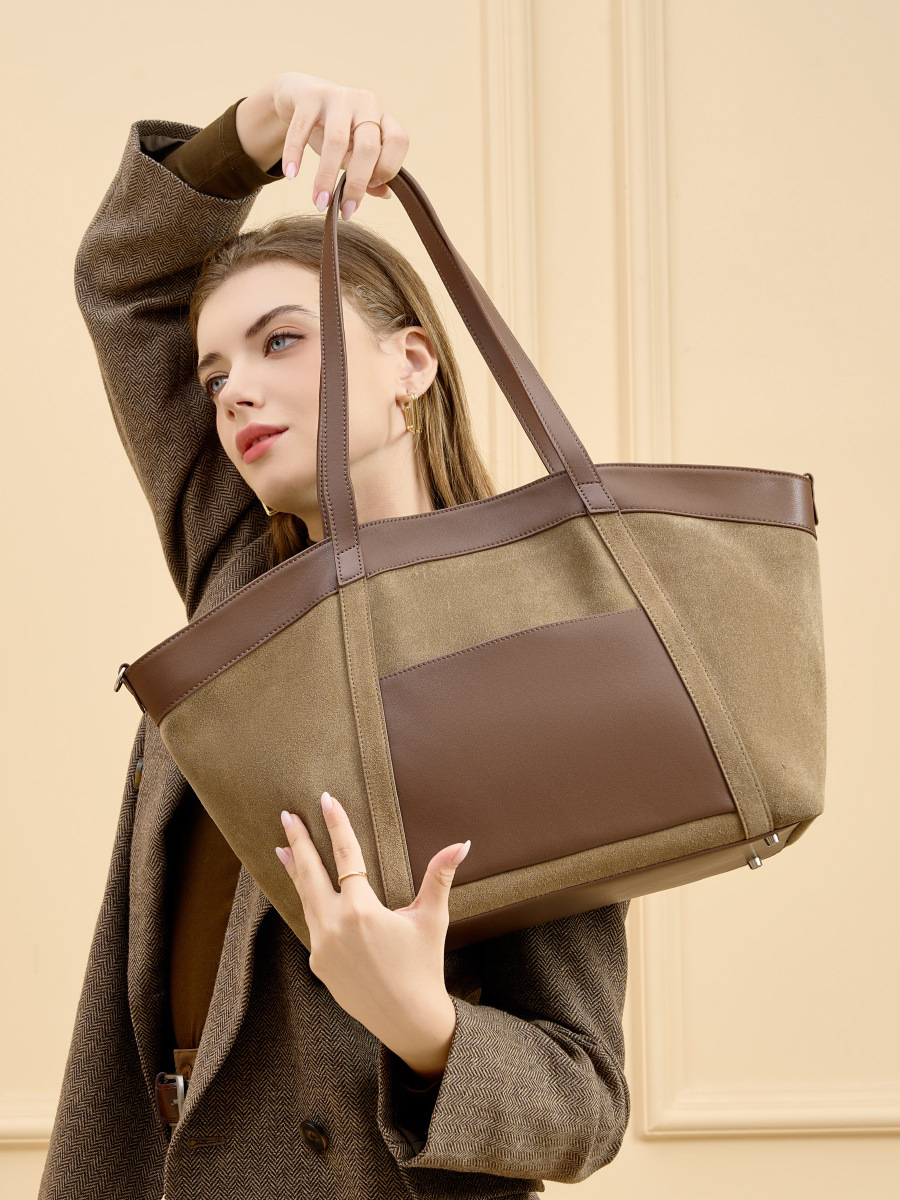 Model showcasing Suede Leather Retro Tote Bag in Khaki