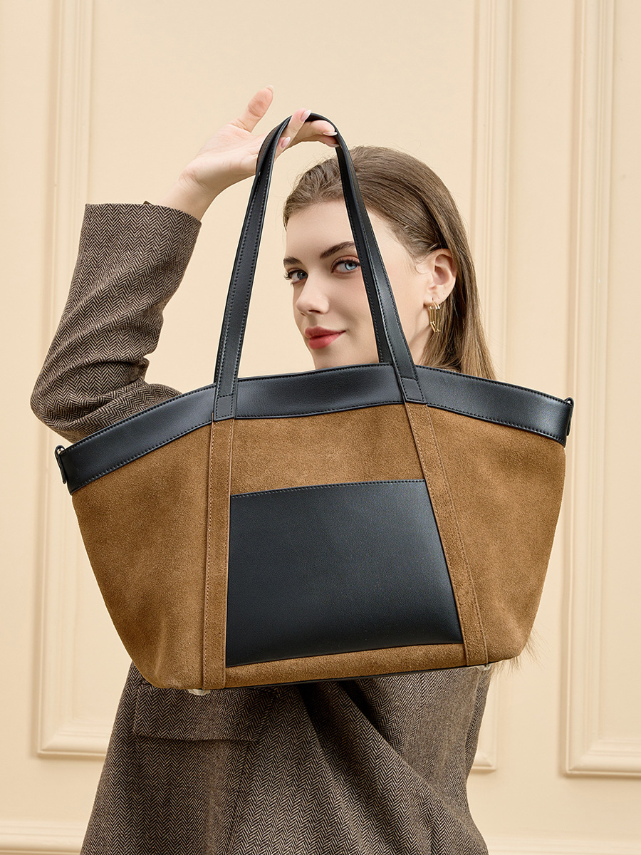Model showcasing Suede Leather Retro Tote Bag in Caramel