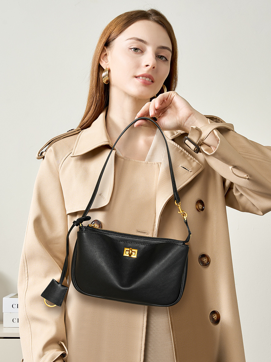 Model showcasing Rodeo Leather Baguette Bag in Black