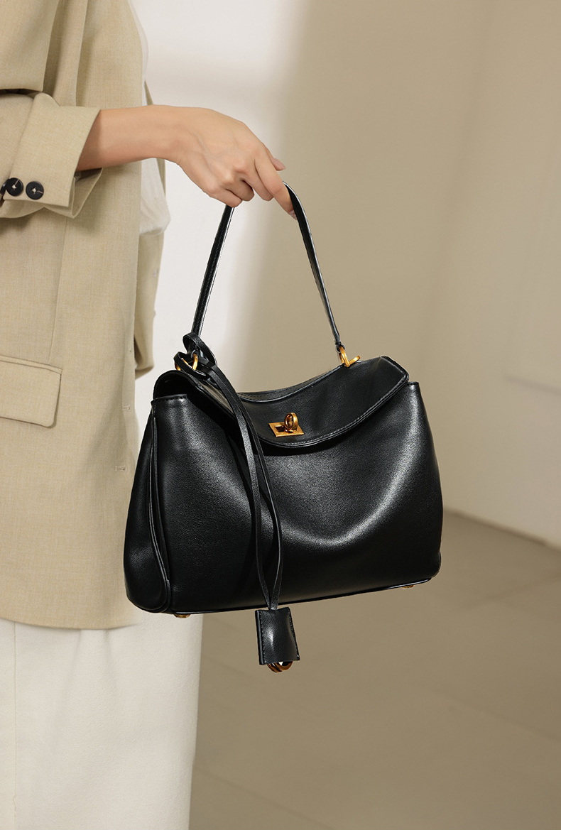 Model showcasing Premium Rodeo Genuine Leather Top Handle Tote Bag in Black (Gold-Tone Lock)