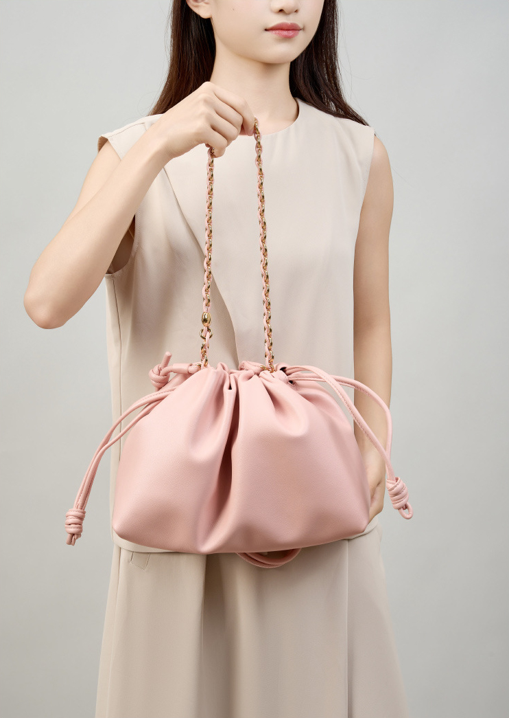 Model showcasing Elegant Genuine Leather Cloud Bag in Pink