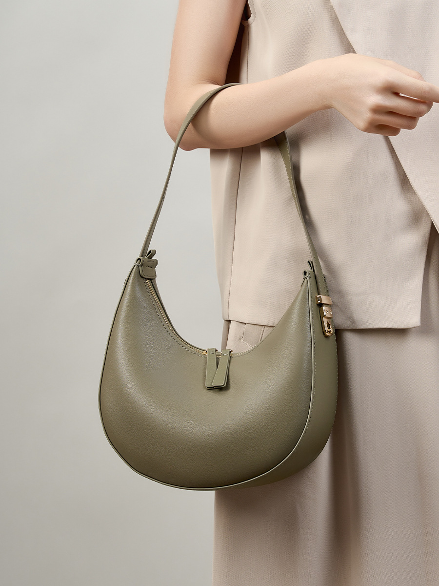 Model showcasing Refined Luna Genuine Leather Half Moon Bag in Gray Green