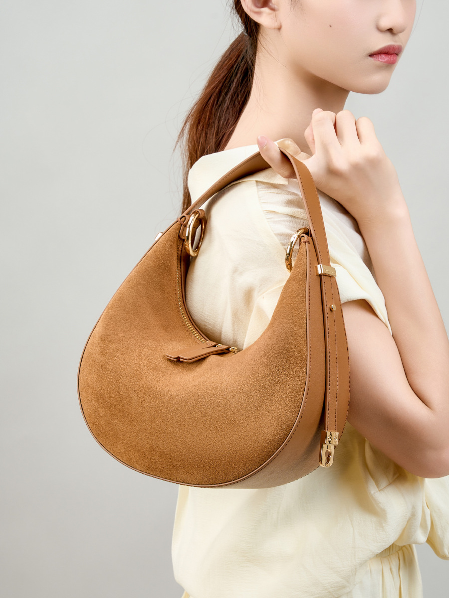Model showcasing Refined Luna Genuine Leather Half Moon Bag in Fallen Leaf Yellow