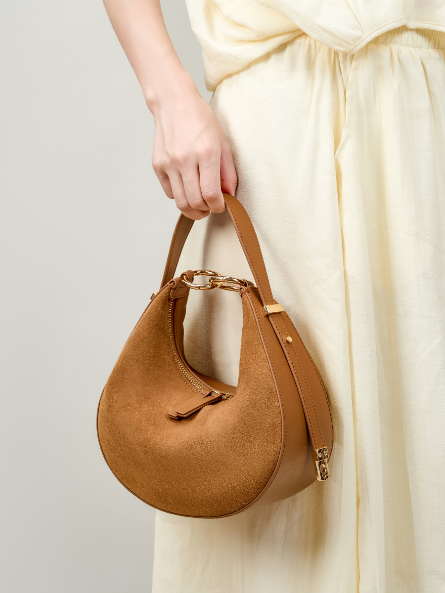 Model showcasing Refined Luna Genuine Leather Half Moon Bag in Fallen Leaf Yellow