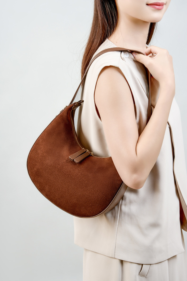 Model showcasing Refined Luna Genuine Leather Half Moon Bag in Cocoa Brown