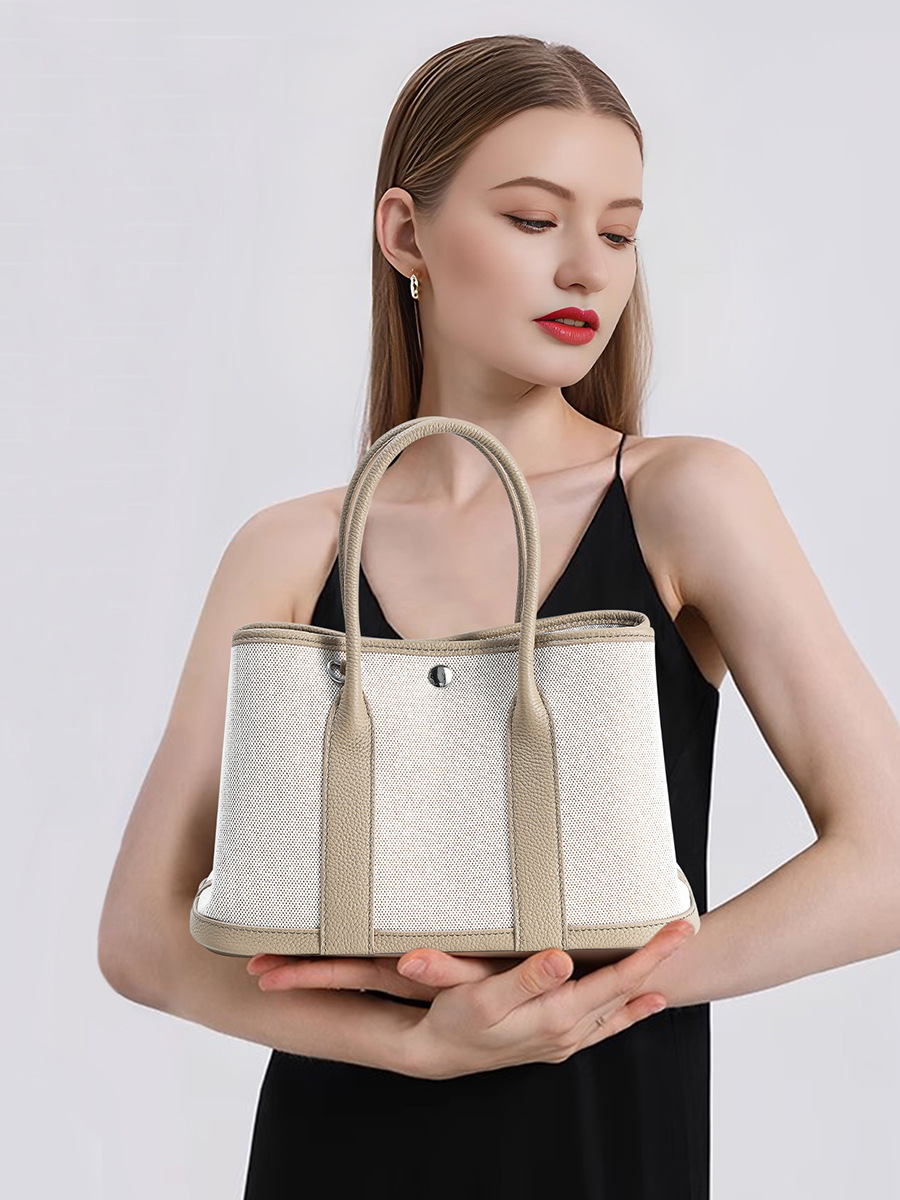 Model featuring Premium Genuine Leather and Canvas Structured Tote Bag in Elephant Gray