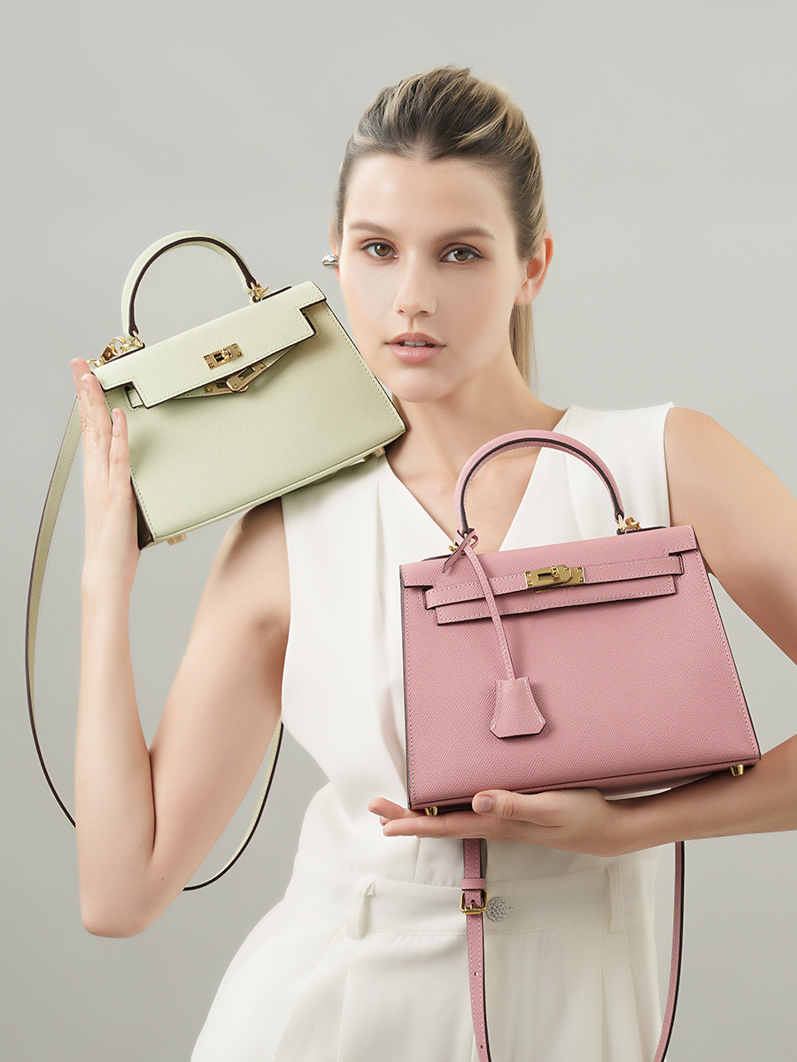 Model showcasing Premium Genuine Leather Structured Top Handle Bags in Mint Green and Sakura Pink