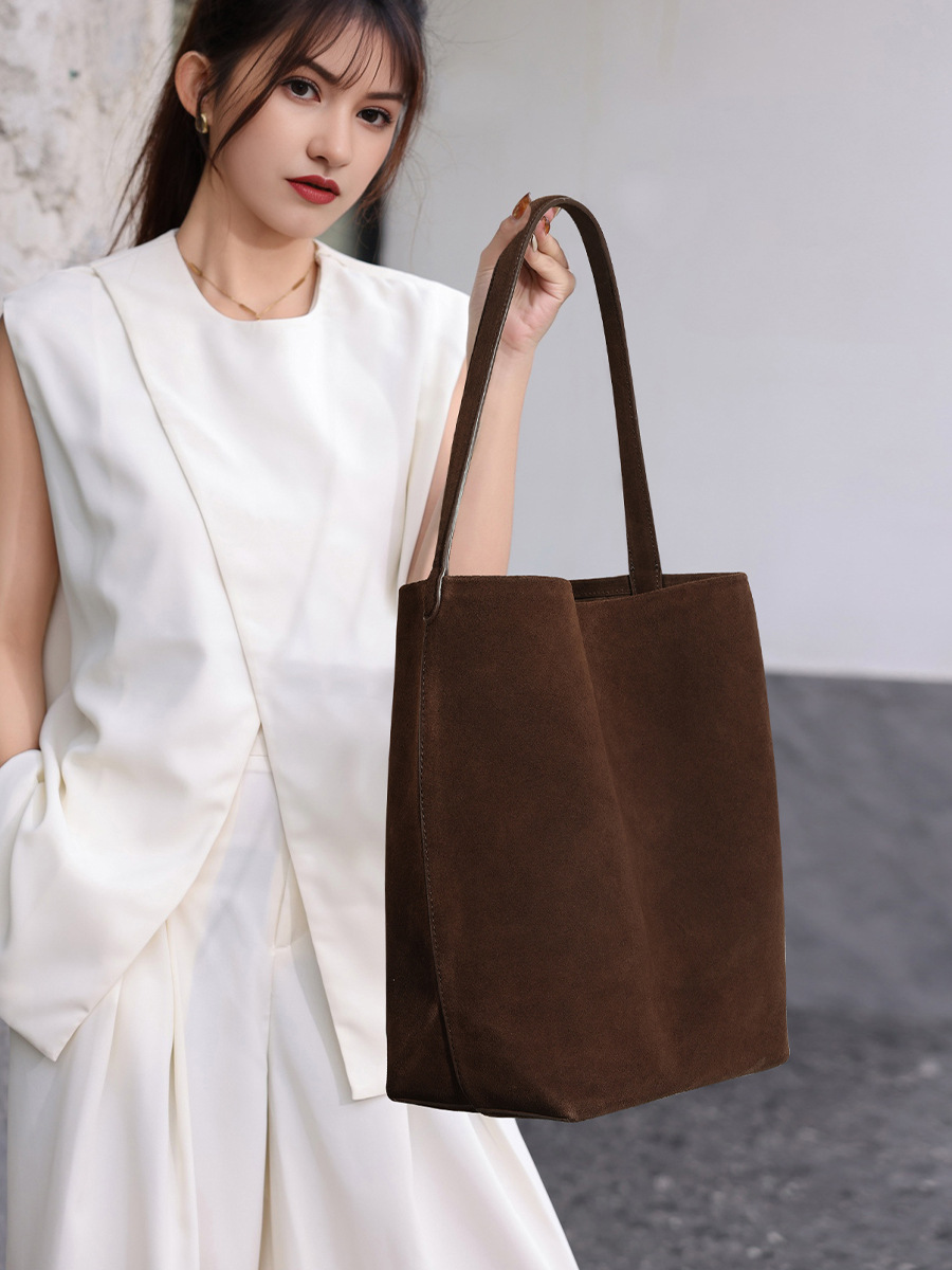 Model showcasing the Refined Suede Leather Bucket Tote Bag in Coffee (Large Size)
