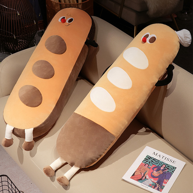Baguette long plush pillows displayed on a sofa, cute bread-shaped plush body cushions perfect for relaxing, hugging, and living room decor