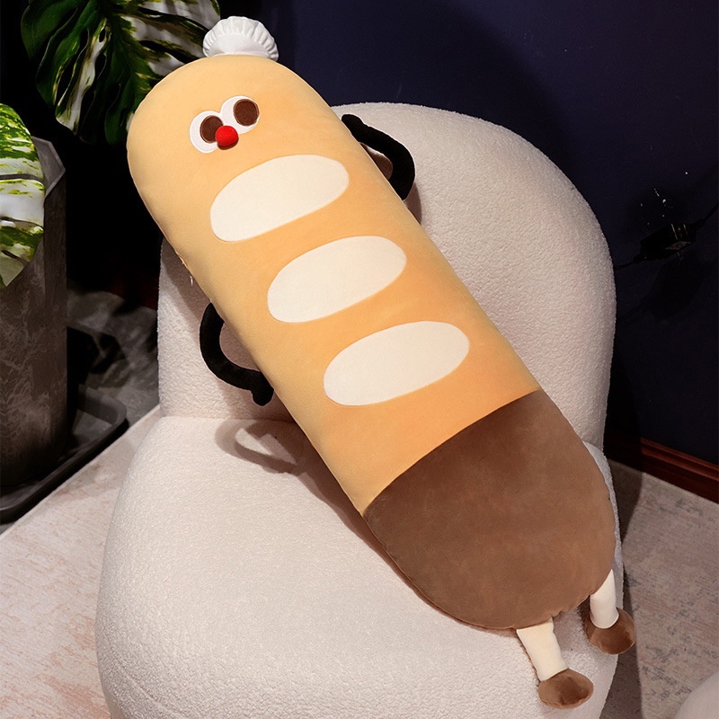 Baguette long plush pillow with chef hat design placed on a chair, soft bread-shaped body cushion ideal for hugging, lounging, and cozy home decor