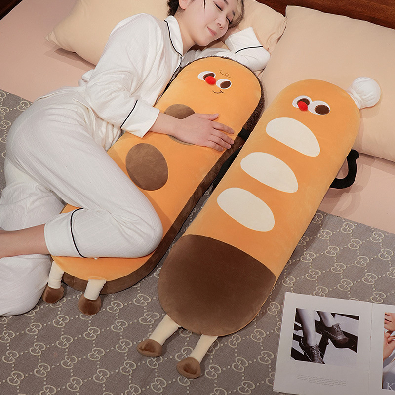 Baguette long plush pillow used as a soft body cushion for hugging and resting on a bed, cute bread-shaped plush pillow for cozy relaxation