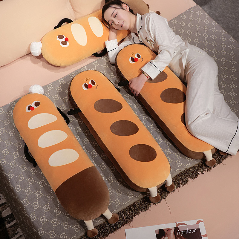 Baguette long plush pillow used as a soft body cushion for lounging and resting, cute bread-shaped plush pillow perfect for cozy bedroom relaxation