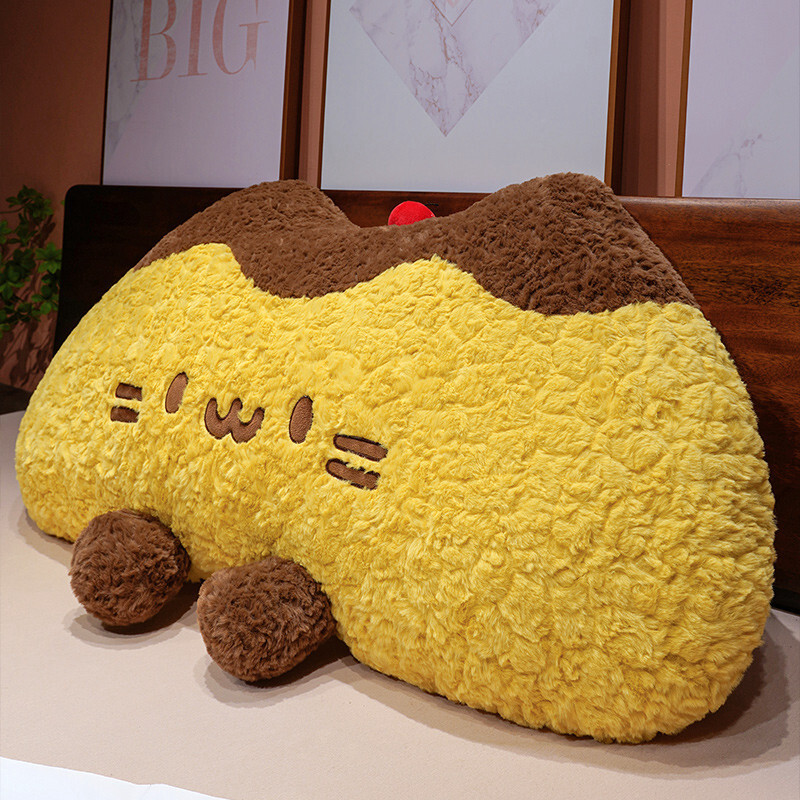 Pudding cat plush backrest pillow on a bed, fluffy pudding cat cushion with soft curly plush fabric designed for comfortable headboard support and cozy bedroom decor