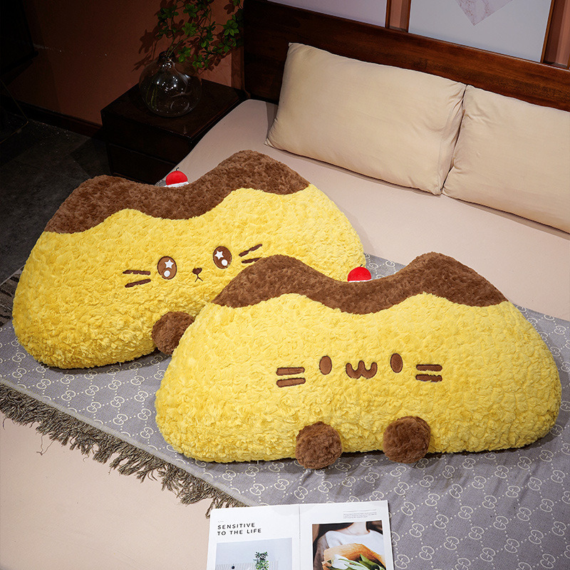 Pudding cat plush backrest pillow on a bed, soft curly plush cushion designed for comfortable back support while relaxing, reading, or lounging in the bedroom