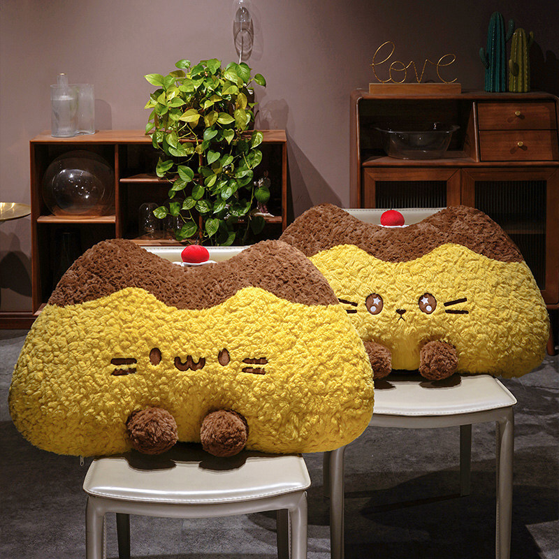 Pudding cat plush backrest pillows with round eyes and starry eyes designs displayed on chairs, soft fluffy cushions for relaxing and cozy room decor