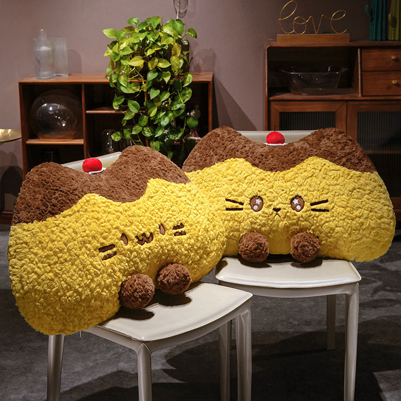Pudding cat plush backrest pillows in round eyes and starry eyes designs placed on chairs, fluffy pudding cat cushions for cozy back support and home decor