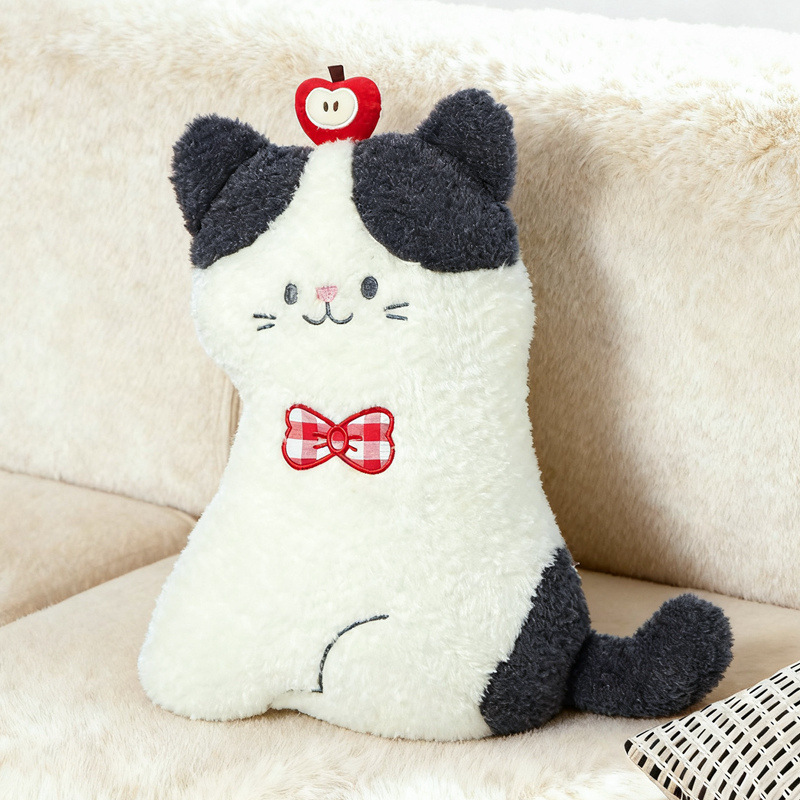 Apple cat plush pillow sitting style soft cat cushion with apple detail and bow, cute plush pillow displayed on a cozy sofa for home decor