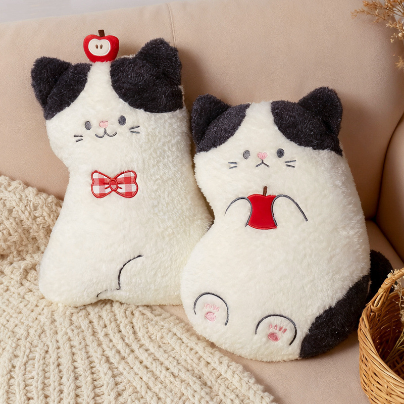 Apple cat plush pillows in sitting and on back styles with apple details, soft cat cushions displayed on a cozy sofa as cute home decor