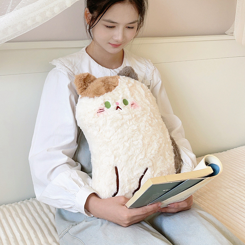Calico cat plush pillow in sitting style with soft fluffy texture, a cozy stuffed cushion perfect for hugging, relaxing, or enjoying quiet reading moments