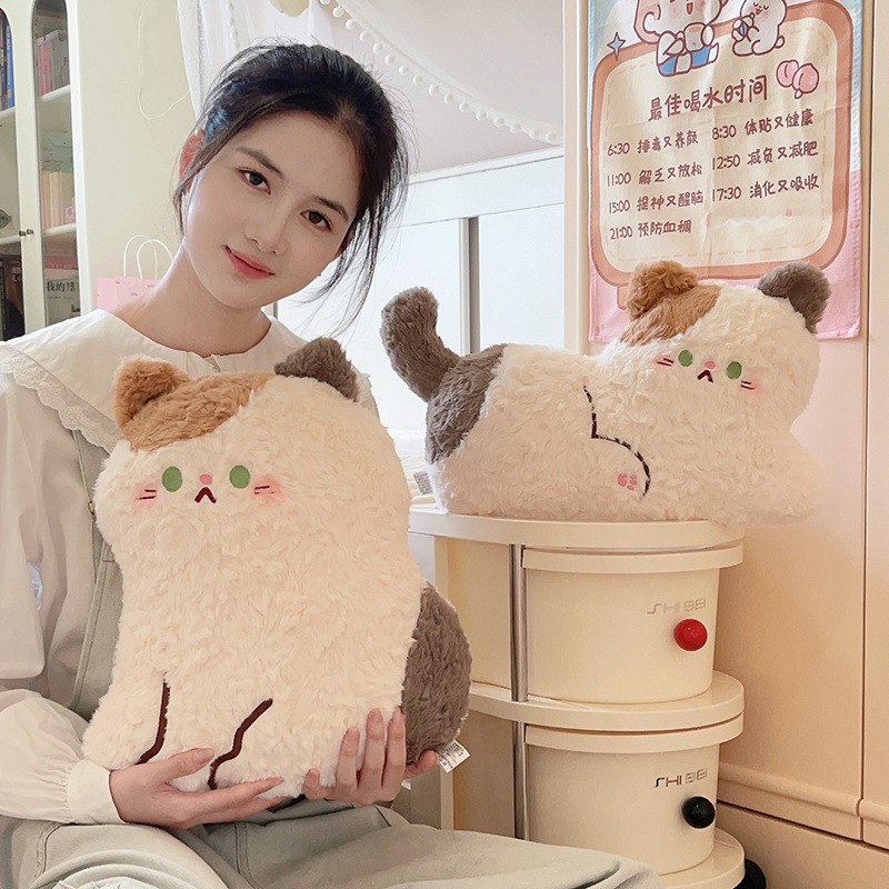 Cute calico cat plush pillow in sitting style with soft fluffy texture, designed for hugging, relaxing, and adding a cozy decorative touch to bedrooms or living spaces