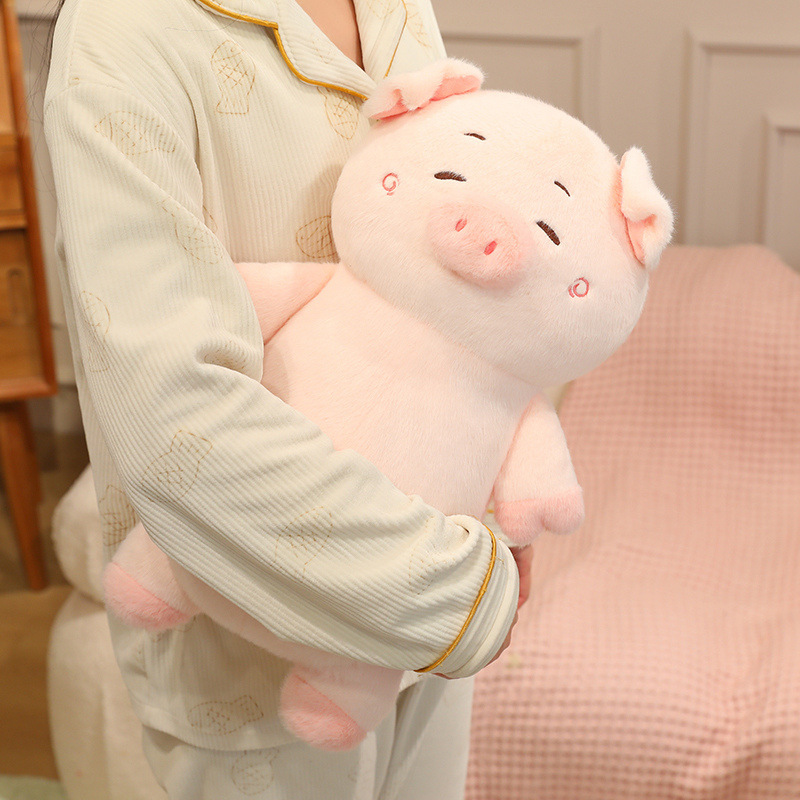 Cute chubby pig plush toy with soft plush texture, cuddly stuffed animal designed for hugging, relaxing, and cozy bedroom decor