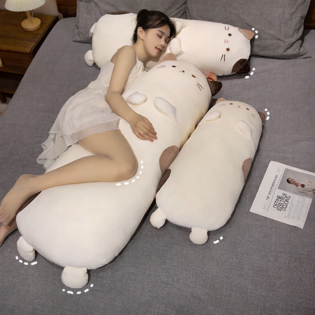 Calico cat long plush pillow soft body pillow on a bed, cute cat design plush cushion ideal for hugging, lounging, and cozy bedroom relaxation