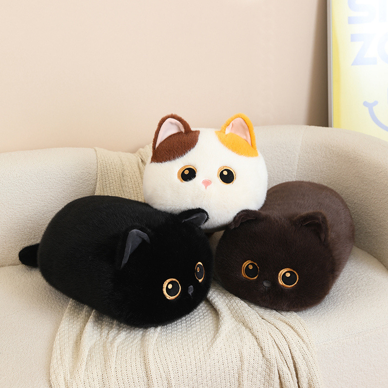Bread cat plush pillows in calico, black and brown styles, fluffy round loaf-cat cushions styled on a sofa for hugging, relaxing and cute home decor