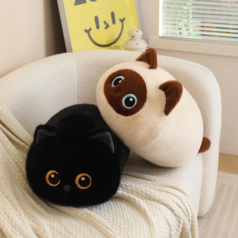 Bread cat plush pillows in black and siamese styles on a sofa, soft round loaf-cat cushions with fluffy texture for hugging, relaxing and cozy home decor