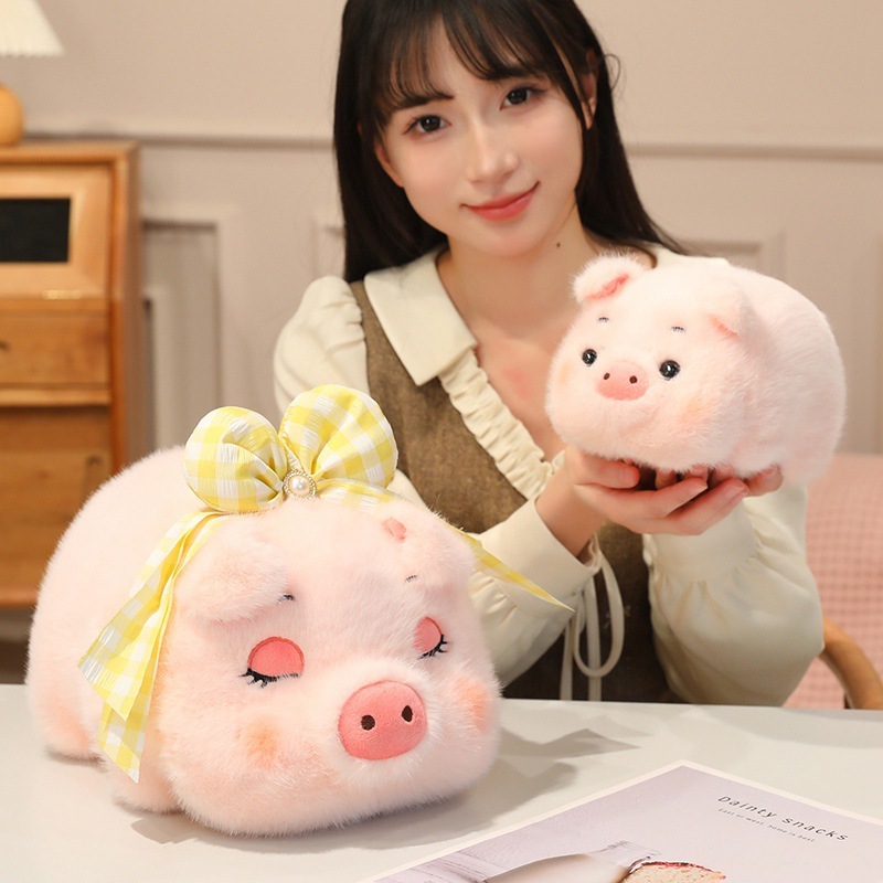 Fluffy pig plush toy with soft pink fur and round chubby design, cute stuffed animal ideal for hugging, relaxing, or cozy home decor