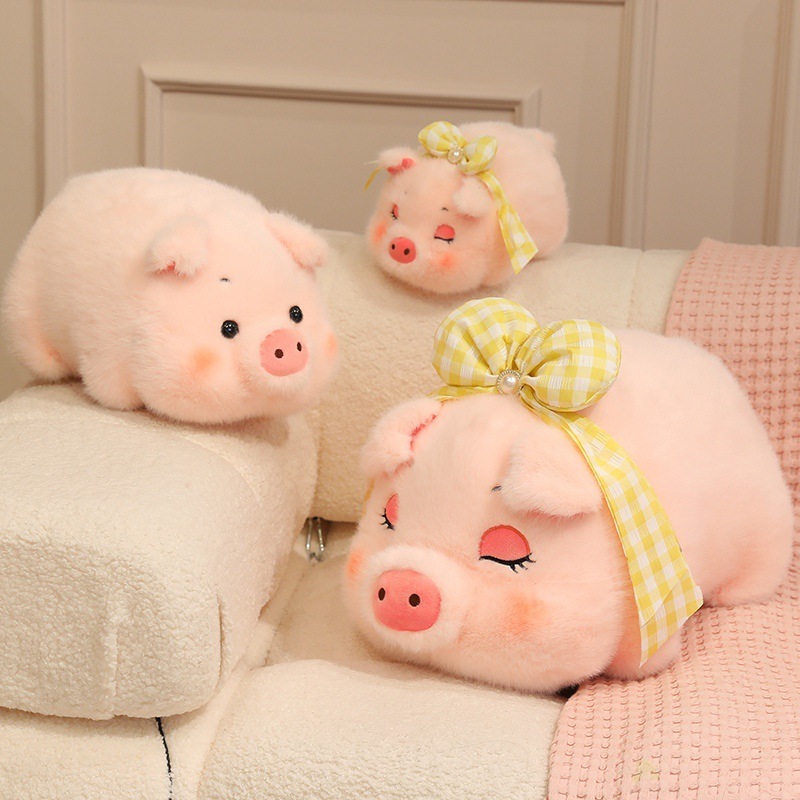 Fluffy pig plush toys in different sizes with round eyes and sleepy eyes designs, soft pink stuffed pigs displayed on a cozy sofa