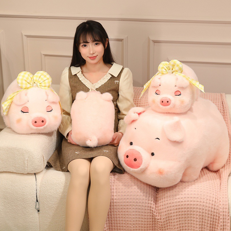 Large fluffy pig plush toy with smaller pig stuffed animals in different sizes, soft pink plush perfect for hugging or sofa decor