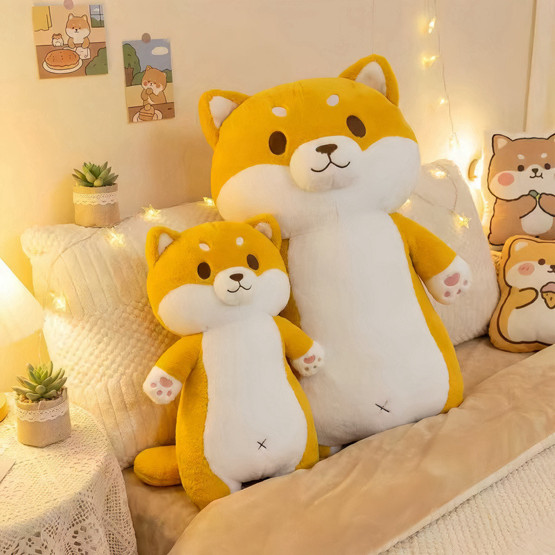 Cute Shiba Inu plush pillow in two sizes on a cozy bed, soft dog plush pillow for hugging, relaxing, and bedroom decor