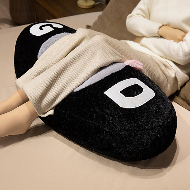 GOOD cat long plush pillow used as a leg support cushion, ideal for relaxing, lounging, and improving comfort while resting on bed