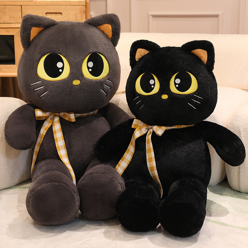 Cat plush toy in gray and black with ribbon detail, soft stuffed animal for cozy home decor and cuddling
