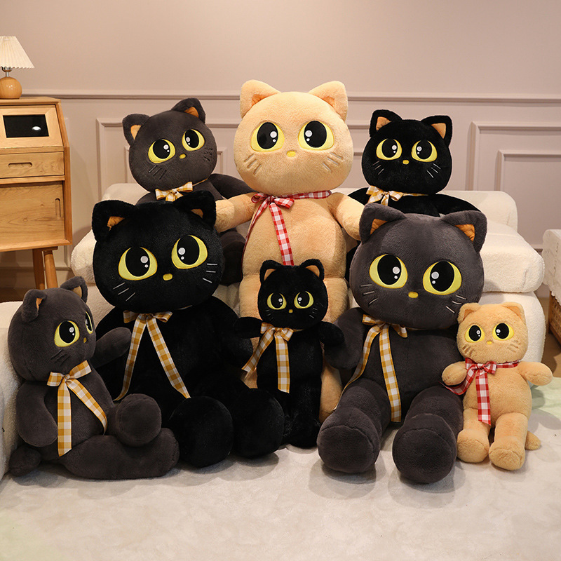 Cat plush toy collection in multiple sizes and colors with ribbon detail, soft stuffed animals for cozy home decor and cuddling